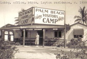 Unidentified woman standing in front of building at Layton's Cottage, Trailer, and Fishing Park - Riviera Beach, Florida.