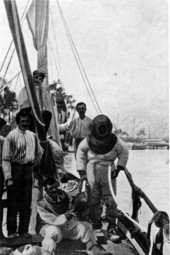 Sponge fishermen wearing their diving suits - Tarpon Springs, Florida