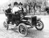Mrs. Patrick Houston and daughters sit in car - Tallahassee, Florida.