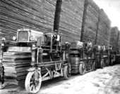 Hauling lumber with straddle carriers at Putnam Lumber Company - Shamrock, Florida