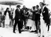 President-elect Warren G. Harding being greeted by people in Miami.