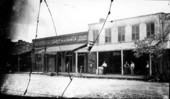 Stores on the west side of Monroe Street between College and Park - Tallahassee, Florida.