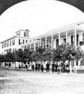 People standing in front of the Putnam House hotel - Palatka, Florida