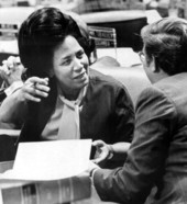 Representatives Gwen Cherry of Miami (left) and Dick Renick of South Miami discussing legislation in the Florida House - Tallahassee, Florida.