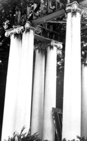 View of cracked and stained porch columns after demolition had begun - Tallahassee, Florida.
