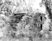 Exterior front view of the George Franklin Drew mansion, in deterioration - Ellaville, Florida