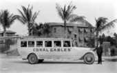 Doc Dammers in street at front of bus - Coral Gables, Florida