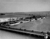 Yachts tied up alongside County Causeway - Miami Beach, Florida.