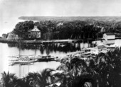 View of Brickell family home at Brickell Point on the Miami River.