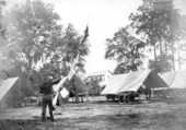 First Lieutenant H.D. Wise of the 9th Infantry signaling with kites during the Spanish-American war
