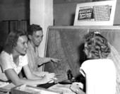 Henry Weimer, football ticket manager, talking to colleagues - Coral Gables, Florida