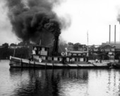 Tugboat "Okoloosa" leaving old Bagdad mill for Pensacola