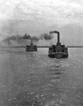 Two steamboats travelling on the waterway - Florida