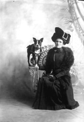 Woman posing for a portrait with her dog - Pensacola, Florida.