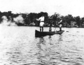 Seminoles shooting game from a canoe