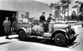 Fire truck with fighters aboard - Coral Gables, Florida