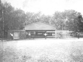 Early biplanes outside hangar - Kissimmee, Florida