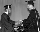 Max Courtney receiving his Bachelor's degree from Florida State University president John E. Champion.