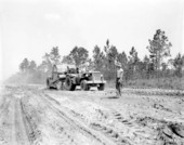 Earth-moving machinery at work on road construction