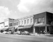 Looking at stores on the west side of Monroe Street between College and Park - Tallahassee, Florida.