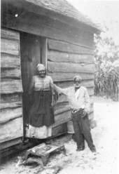 Wesley and Mary Sherman outside their cabin - Eustis, Florida.