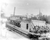 Paddle steamer "City of Hawkinsville of Tampa" moored at a dock on the Suwannee River - Florida