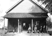 Sitting in front of Mr. Herring's store - Miccosukee, Florida