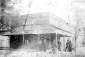 People standing in front of J.T. Budd & Son dry goods store - Monticello, Florida