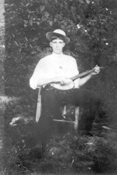 Noah Grantham with banjo - Fanlew, Florida