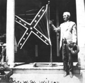 William W. Wilson holding confederate flag - Quincy, Florida