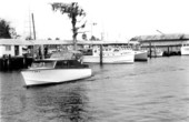Boat traveling on the Saint Marks River by the docks - Saint Marks, Florida