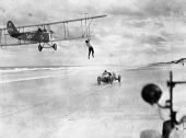 Auto-to-airplane transfer stunt - Daytona Beach, Florida