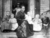 Josephine Wakefield Porter (Mrs. Edward) and children on the porch steps - Saint George Island, Florida