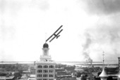 Biplane flying around Tampa's City Hall - Tampa, Florida