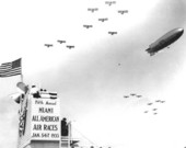 Airship Akron leaving for Cuba with bomber escort
