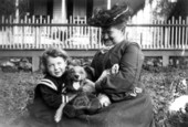 Boy, dog and woman enjoying each other's company - Tallahassee, Florida.
