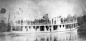 Steamboat "Walkatomica" loaded with passengers running on the waterway - Florida