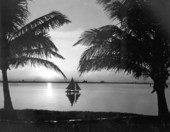 Silhouette of sailboat in Biscayne Bay - Miami, Florida.