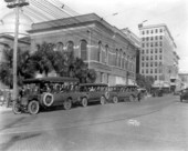 Tourist buses beside the Hillsborough County Courthouse - Tampa, Florida.