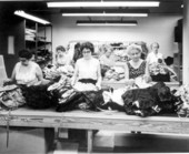 Final inspection of dresses at Alix of Miami