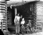 Brown family on the steps of their home - Lake County, Florida