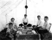 Children eating in a tent - Melrose, Florida