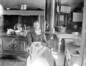 Unidentified woman in her kitchen - Melrose, Florida
