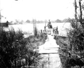 Mrs. Leigh M. Pearsall and fishing gear at end of dock - Melrose, Florida