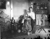 Mrs. Maxon knitting a rug in the sitting room of her home - Saint Andrews, Florida