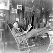 Mr. Maxon reading in the sitting room of his home - Saint Andrews, Florida