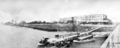 Boat dock on Lake Worth with buildings in background - West Palm Beach, Florida.