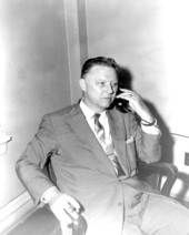 Senator Harry E. King on the phone after designation as President of the 1957 Senate.