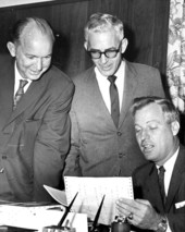 House Speaker Mallory Horne and colleagues look over legislative vote results on auto tag price increase - Tallahassee, Florida.