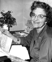 Representative Maxine Baker smiles as holding a telegram and letters protesting her mental bill - Tallahassee, Florida.